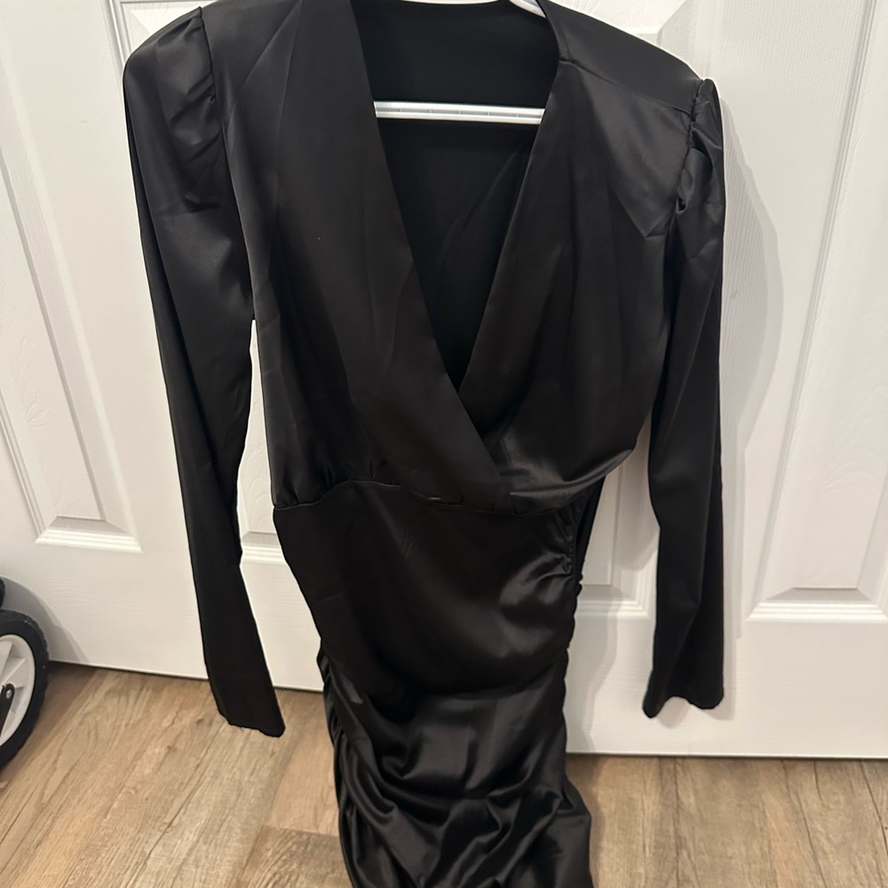 Black long sleeve bodycon dress with shoulder pads